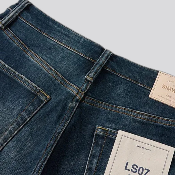 Mid-waist dark sanded men's jeans