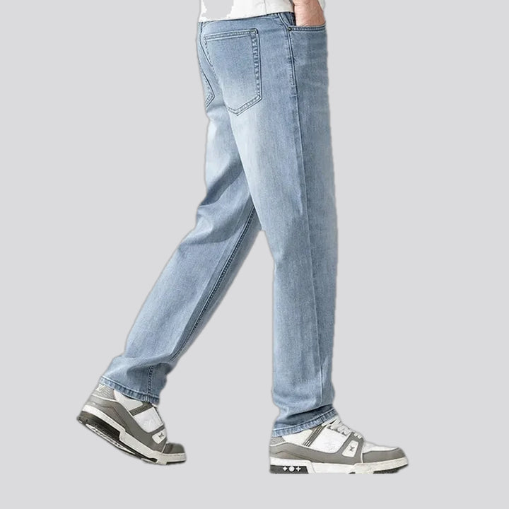 Mid rise light sanded men's jeans